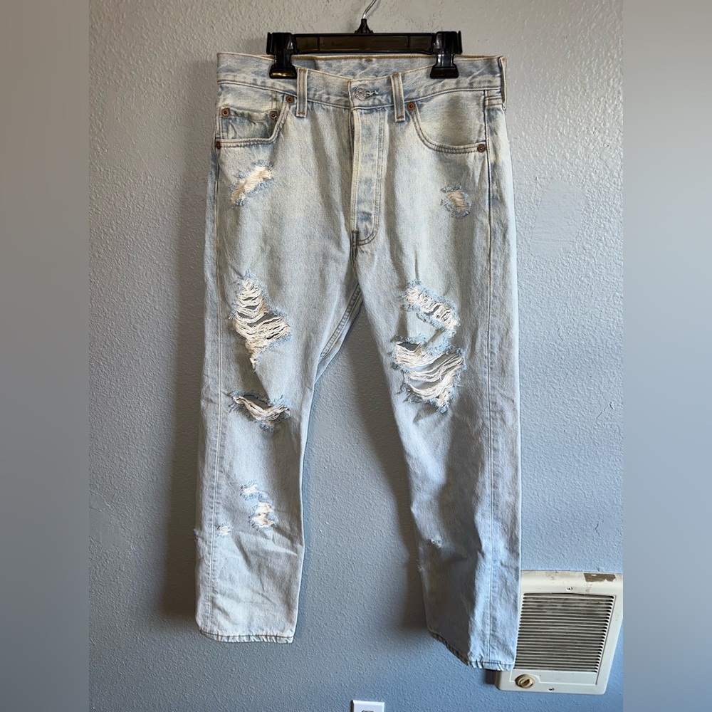 Vintage Levi’s straight leg distressed jeans